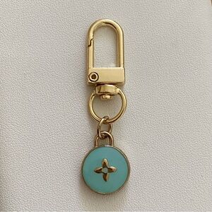 Authentic vintage teal Louis Vuitton charm